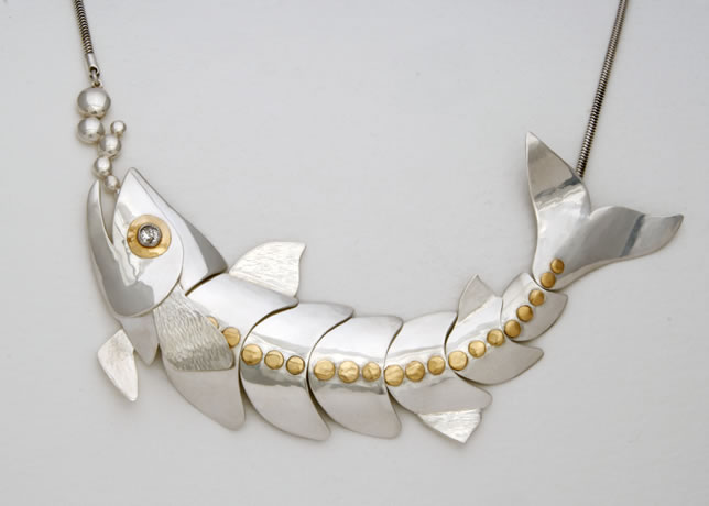 Big silver fish necklace with gold detail commissioned for Jane